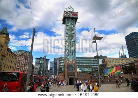 OSLO NORWAY - AUGUST 18 2016: People walking on wonderful Plaza in front of Oslo Central station on nice sunny day in Oslo Norway on August 182016.