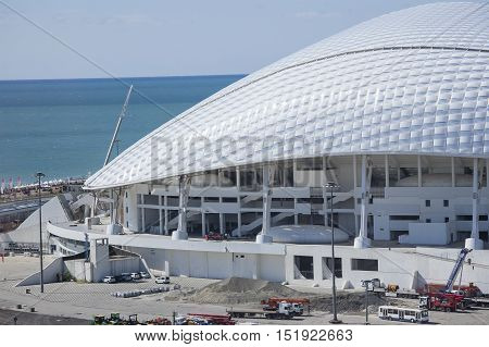Sochi, Russia - September 24: Bolshoy Ice Dome and football stadium Fischt at the Park preparing for the soccer World Cup 2018 on September 24, 2016