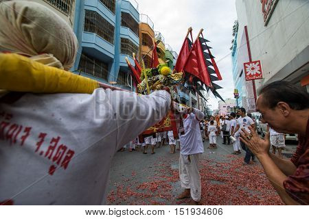 Hatyai, Songkhla, Thailand - Oct. 7, 2016 :  People celebrate a vegetarian festival during the festival ritual mortification is practised to appease the Gods.Action photography Capturing movement.