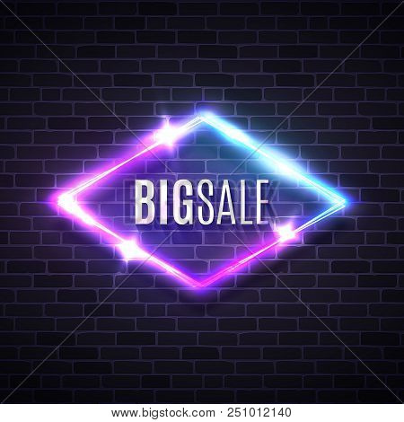 Big Sale Neon Rhomb Sign On Brick Wall. Retro Light Lozenge Banner With Neon Effect. Techno Rhombus 