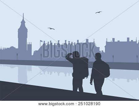 Silhouette Of Two Tourists With Backpacks On The Thames River In London At Westminster Palace And Bi