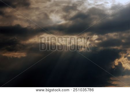 Clouds In The Evening Sky With The Rays Of The Sun