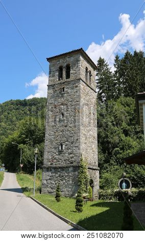 Ancient Stone Bell Tower Of A Small Village In The Mountains