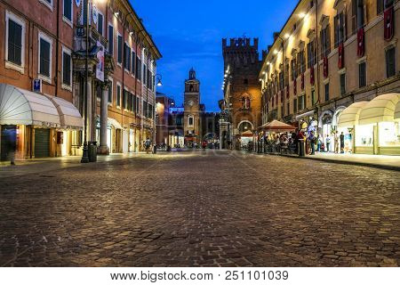 Ferrara, Italy - July, 23, 2018: street in the historical center of Ferrara at a night