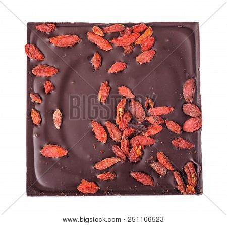 Black Bitter Chocolate With Goji Berries. Studio Photo