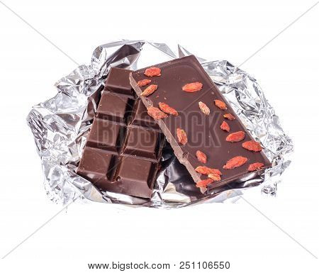 Black Bitter Chocolate With Goji Berries. Studio Photo