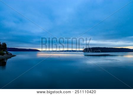 Early Morning Over The Puget Sound With Heavy Cloudcover