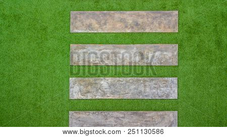 Aerial Top View Concrete Pathway And Artificial Grass.