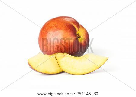 Group Of One Whole Two Slices Of Ripe Deep Red Nectarine Isolated On White