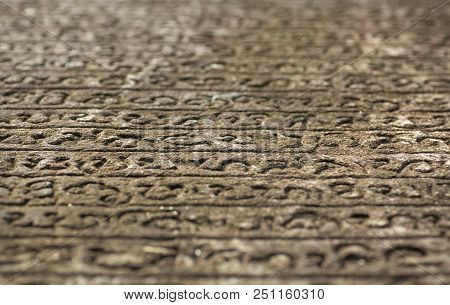 Historical Manuscript On Stone. Sinhalese Language On 12th Century Wall Of Hindu Temple. Polonnaruwa