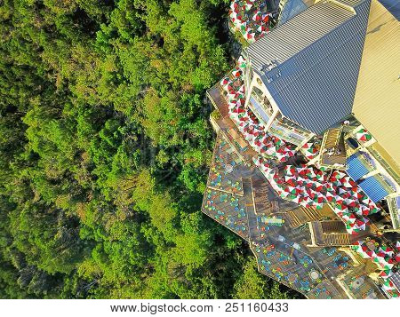 Top View Colorful Restaurant Near Cliff Rock Wall In Austin, Texas, Usa