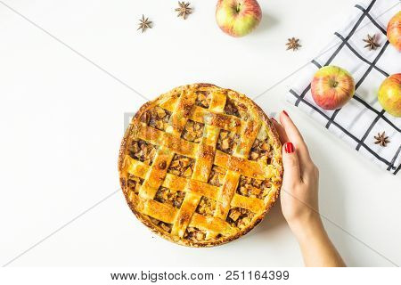 Traditional American Apple Pie With Dough Decoration In A Grid On A White Table. Autumn Baking Conce