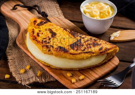 Cachapa With Cheese, Typical Venezuelan Dish Made With Corn, Cheese And Butter
