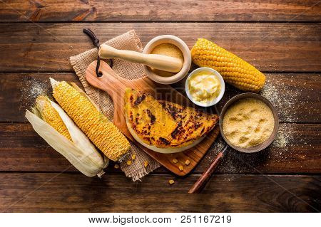 Typical Venezuelan Cuisine, Top View Of A Wooden Table With Several Ingredients For The Preparation 