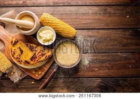 Typical Venezuelan Cuisine, Top View Of A Wooden Table With Several Ingredients For The Preparation 