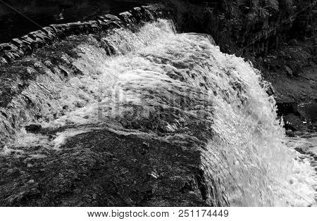 Small Waterfall On Sablinka River In Leningrad Region, Russia. Black And White.