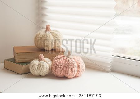 Cosy And Soft Winter, Autumn, Fall Background, Knitted Decor And Books On An Windowsill. Christmas, 