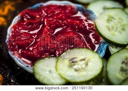 Close Up Of Ingredients An Face Pack Of Raw Fresh Vegetables  On Gothic Surface I.e. Tomato Puree An