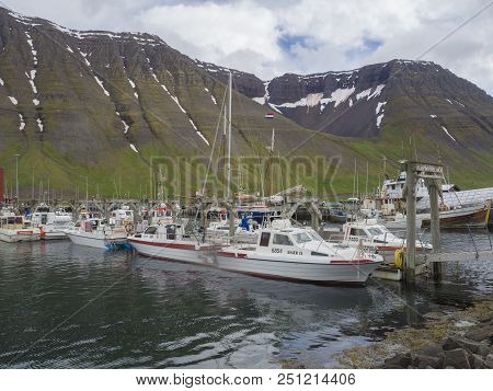 Iceland, West Fjords, Isafjordur, June 25, 2018: Summer View On Isafjordur Harbor With Fishing Boats