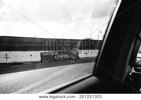 Paris, France - Jul 14, 2018:v Iew From The Car Of Graffiti Sign On The Peripherique Highway Border 