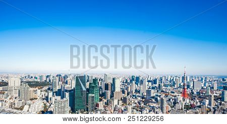 Panoramic Modern City Skyline Aerial View Under Blue Sky In Tokyo, Japan