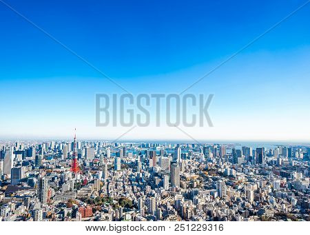 Panoramic Modern City Skyline Aerial View Under Blue Sky In Tokyo, Japan