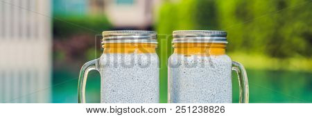 Healthy Layered Dessert With Chia Pudding And Mango Morning On The Background Of The Pool. Banner, L