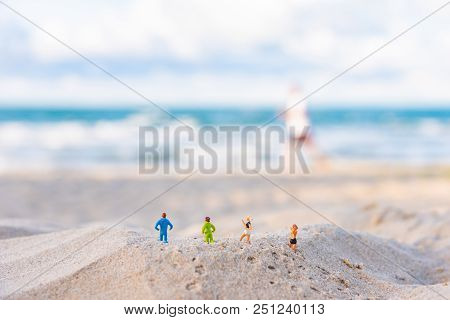 Image Of Two Runner On Sand Beach.