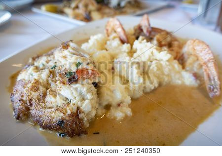 Baked Fish Fillet, Crab Meat And Shrimp Dish, Presented As A Catering Concept.