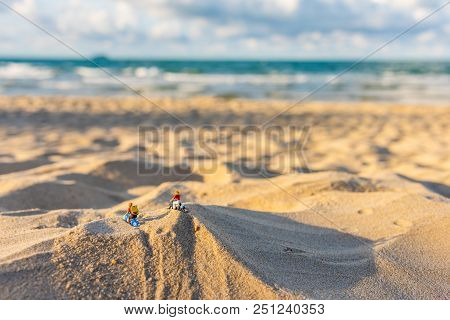 Dolls Couple Biker On The Sand Beach.