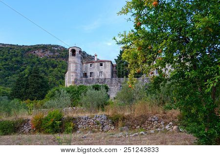 Monastery Podmaine, Or Podostrog, In Background Of Mountains, Budva, Montenegro