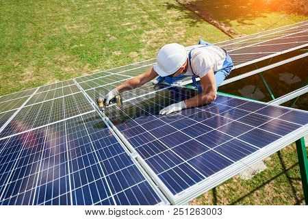 Innovative Solar Panels Installing By Professional Mounter. High-tech Exterior, Modern Equipment, Ec