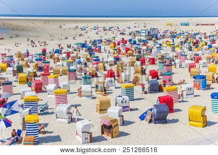 Borkum, Germany - July 25, 2018: Many Colorful Tents And Beach Chairs On Borkum Island In Germany