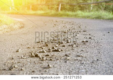 Stones Scattered On The Asphalt Road, Stones Scattered On The Asphalt Road, The Road Going To The Di