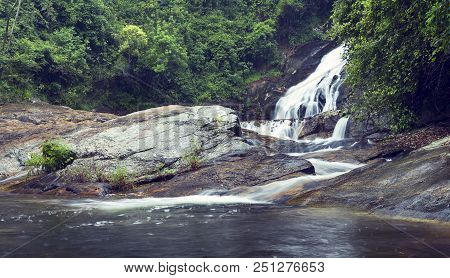 River Flowing Over Wet Rocks And The Debengeni Waterfall Artistic Conversion