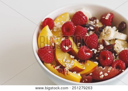 Breakfast Meal: Quick Cook Oats, Plum, Nectarine Slices, Banana, Dried Cranberry And Fresh Raspberry