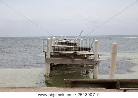 Destroyed Pier After Hurricane Made Landfall On The Island