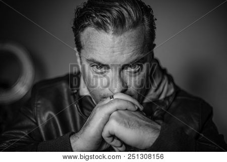 Portrait Of A Handsome Man In A Lether Jacket