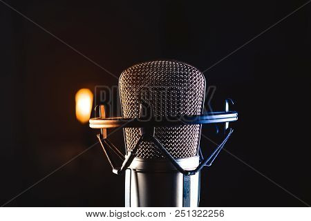 Professional Studio Condenser Microphone On Black Background