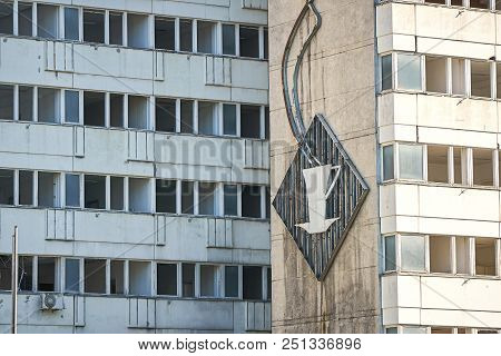Old Broken Gdr Neon Sign On The Facade Of A House In Berlin