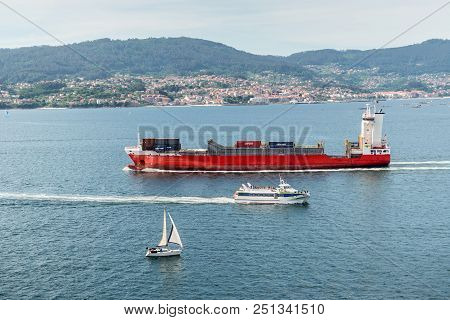 Vigo, Spain - May 20, 2017: Ships And Yacht Sailing On The Vigo Inlet On Its Way To Vigo And Back, G