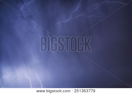 Flashes Of Lightning In The Night Sky. Lightning Strike. Night Sky. Storm Cloud.
