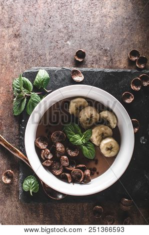 Chocolate Pudding, Banana And Herbs In