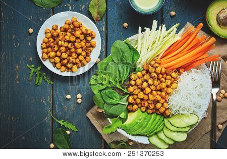 Top View Of Ingredient Set For Cooking Vegan Food, Fried Chickpeas, Rice Noodles With Wegetables On 