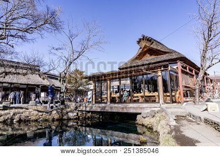 Yamanashi, Japan - January 6, 2018 : Main House And Clear Spring Water Pond In Oshino Hakkai Village