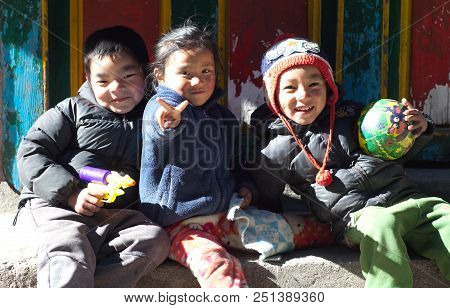 Namche Bazaar, Nepal - January 19, 2017: Nepalese Children Poses For A Photo On The Street