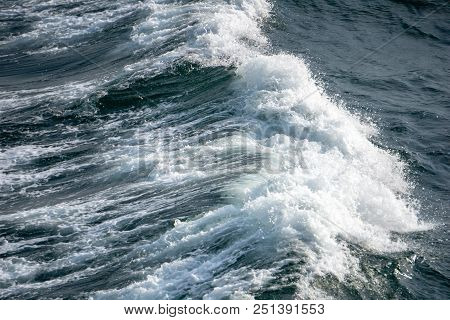Wave Form And Water Splash Created By Vessel Sail Through The Sea Or Ocean