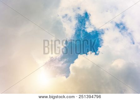 Divine Light From The Sun In A Clear Cloud And Blue Sky