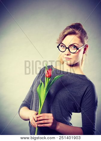 Delicacy And Subtlety Of Women. Young Adorable Woman With Spring Flower. Portrait Of Beauty Delicate
