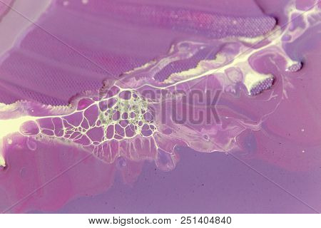 Abstraction Of The Flowing Multi-colored Acrylic Paints